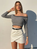 Gonna in ecopelle con zip laterale bianca