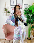 Cardigan con frange e cinta lilla
