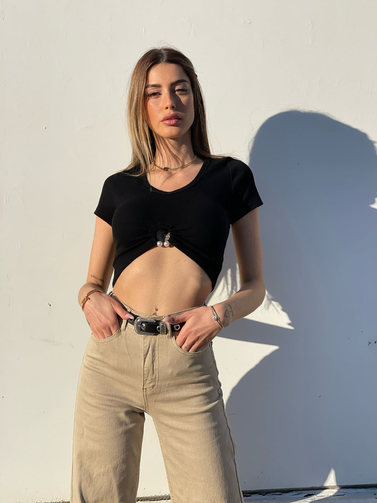Top a manica corta con cerchio nero