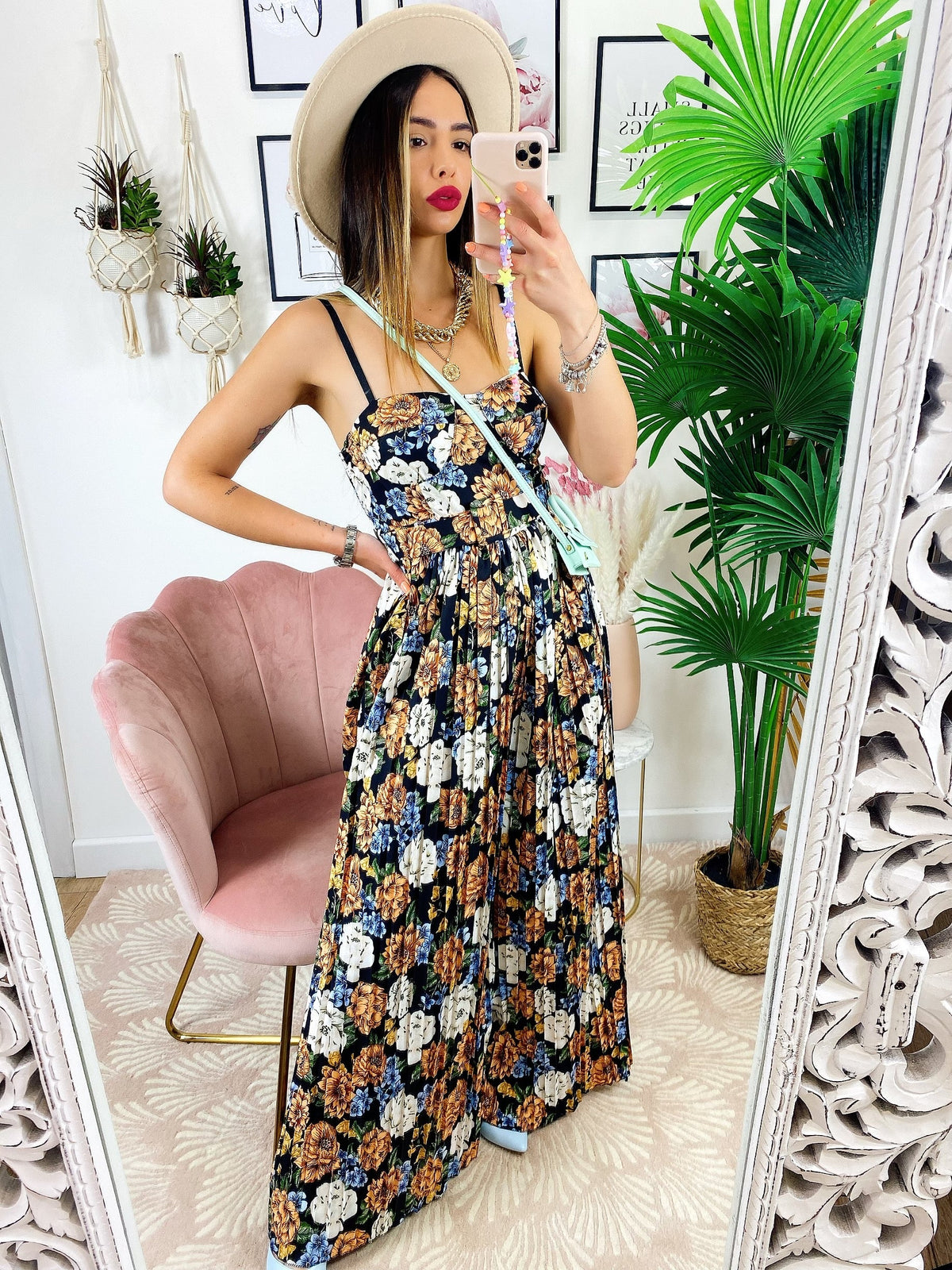 Tuta floreale con pantalone a pieghine