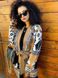 Cardigan camel con frange e cinta