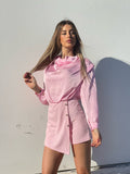 Tutina a portafoglio rosa