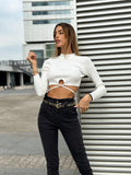 Top bianco a costine con lacci