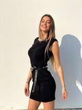 Abito in maglia nero con catena