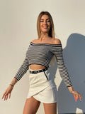 Gonna in ecopelle con zip laterale bianca