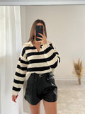 Short in ecopelle nero con cintura