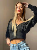 Maglione nero con lacci