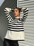 Maglione a righe collo alto