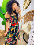 Abito lungo con scollo a barchetta con fiori colorati