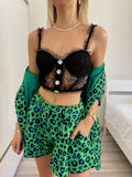 Bralette in pizzo con bottoni gioiello nera
