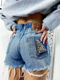 Short Levi’s Vintage bagno medio con borchie