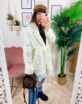 Cardigan sfrangiato bianco