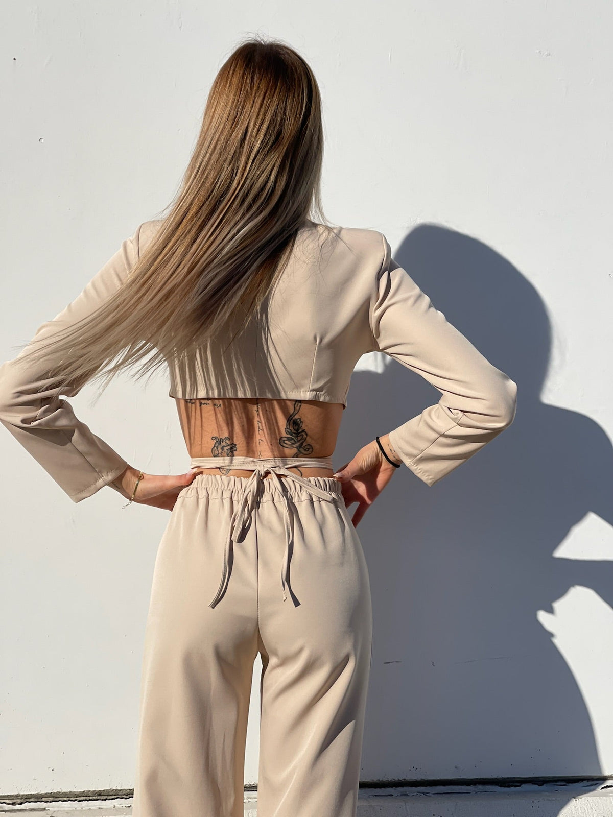 Completo top e pantalone beige