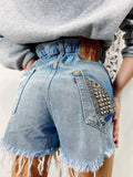 Short Levi’s Vintage bagno chiaro con borchie