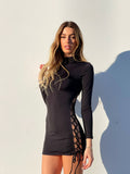 Abito nero con stringhe alte