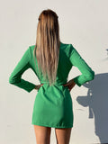 Abito a blazer verde con dettagli oro