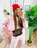 Completo sportivo con righe Rosa
