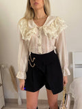 Camicia in pizzo beige