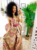 Abito in raso floreale con maxi spacco nude