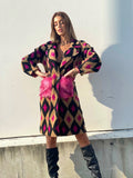 Cappotto a rombi fuxia