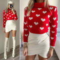 Maglione rosso con cuori