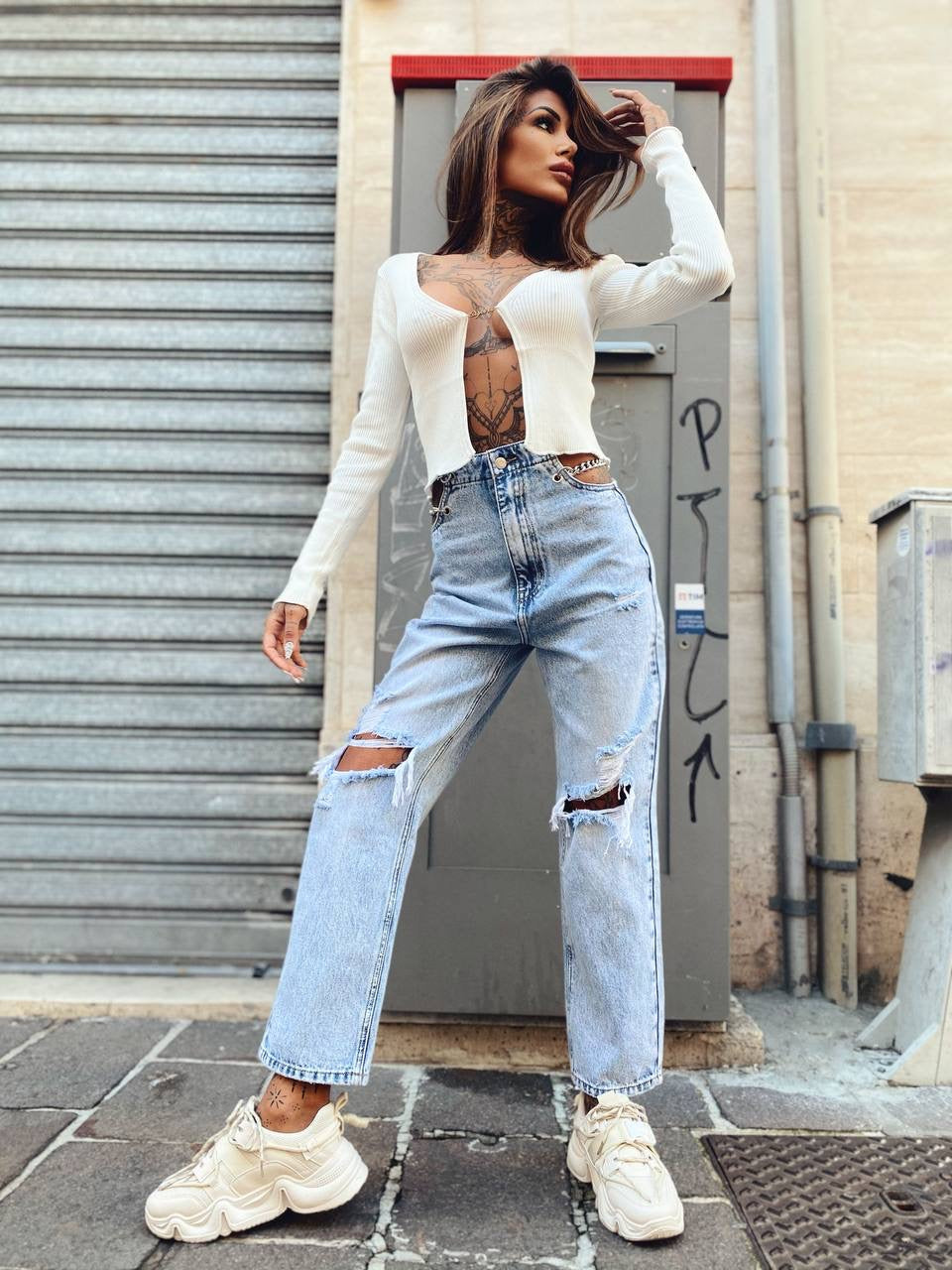 Jeans con catena argento