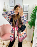 Cardigan A rombi dettagli rosa con frange e cinta
