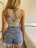 Bralette in pizzo bianca con farfalla