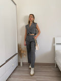 Completo top crop e pantalone grigio