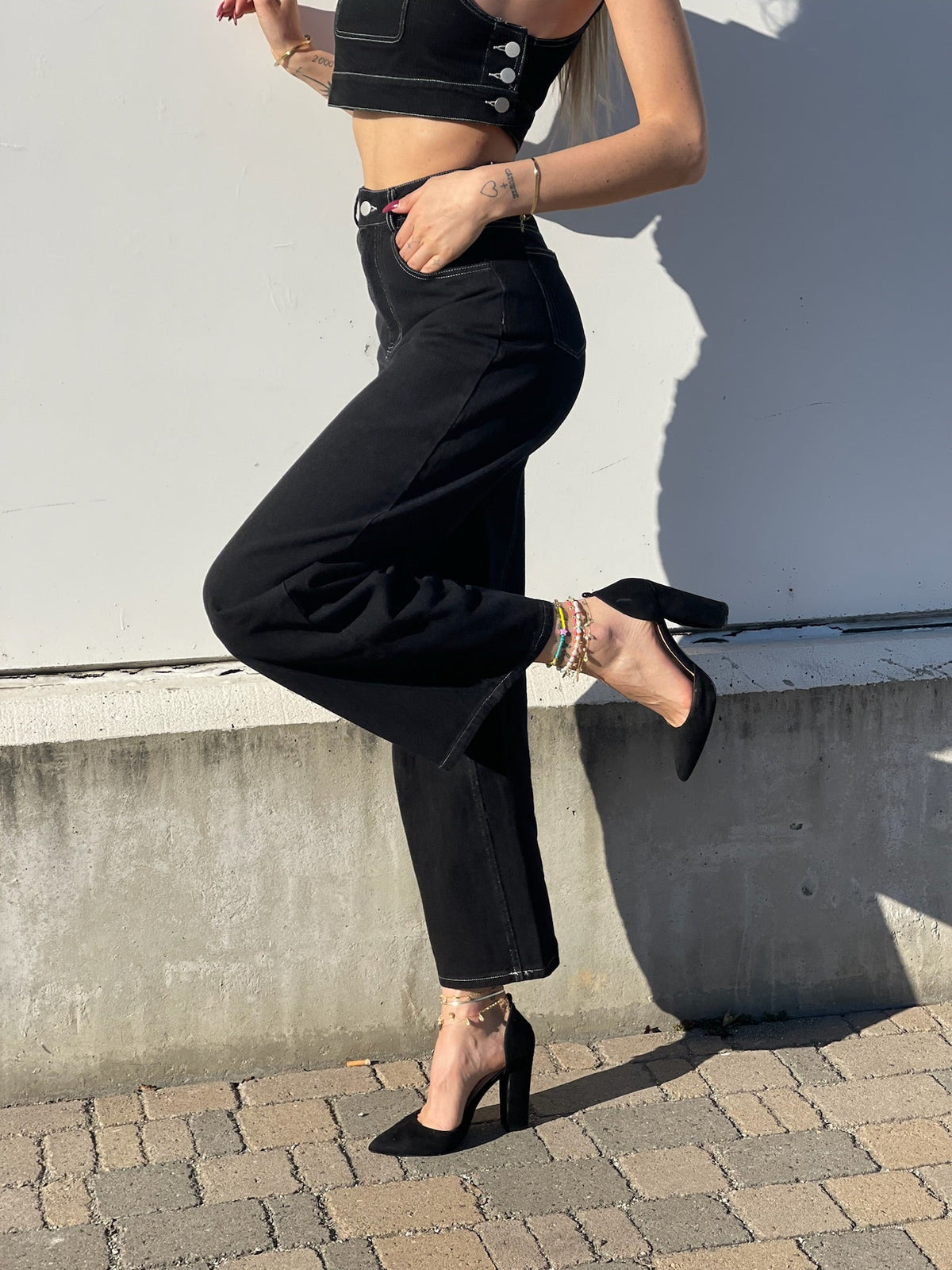 Completo top e jeans nero