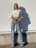 Jeans wide leg con strappi e dettaglio