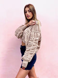 Cardigan panna a trecce