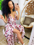 Abito con gonna asimmetrica e fiorellini rosa