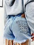 Short Levi’s Vintage bagno chiaro con borchie