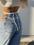 Jeans con catena argento