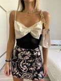 Body con fiocco