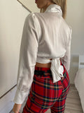 Top in raso bianco con fiocco