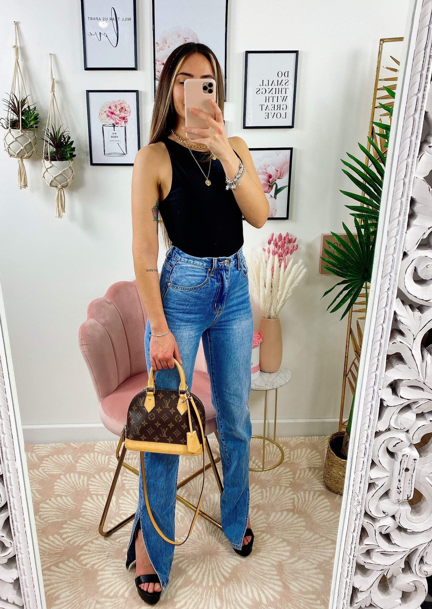 Jeans a vita alta con spacco inferiore