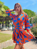 Abito arancio fiori azzurri
