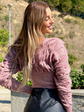 Maglione rosa con lacci