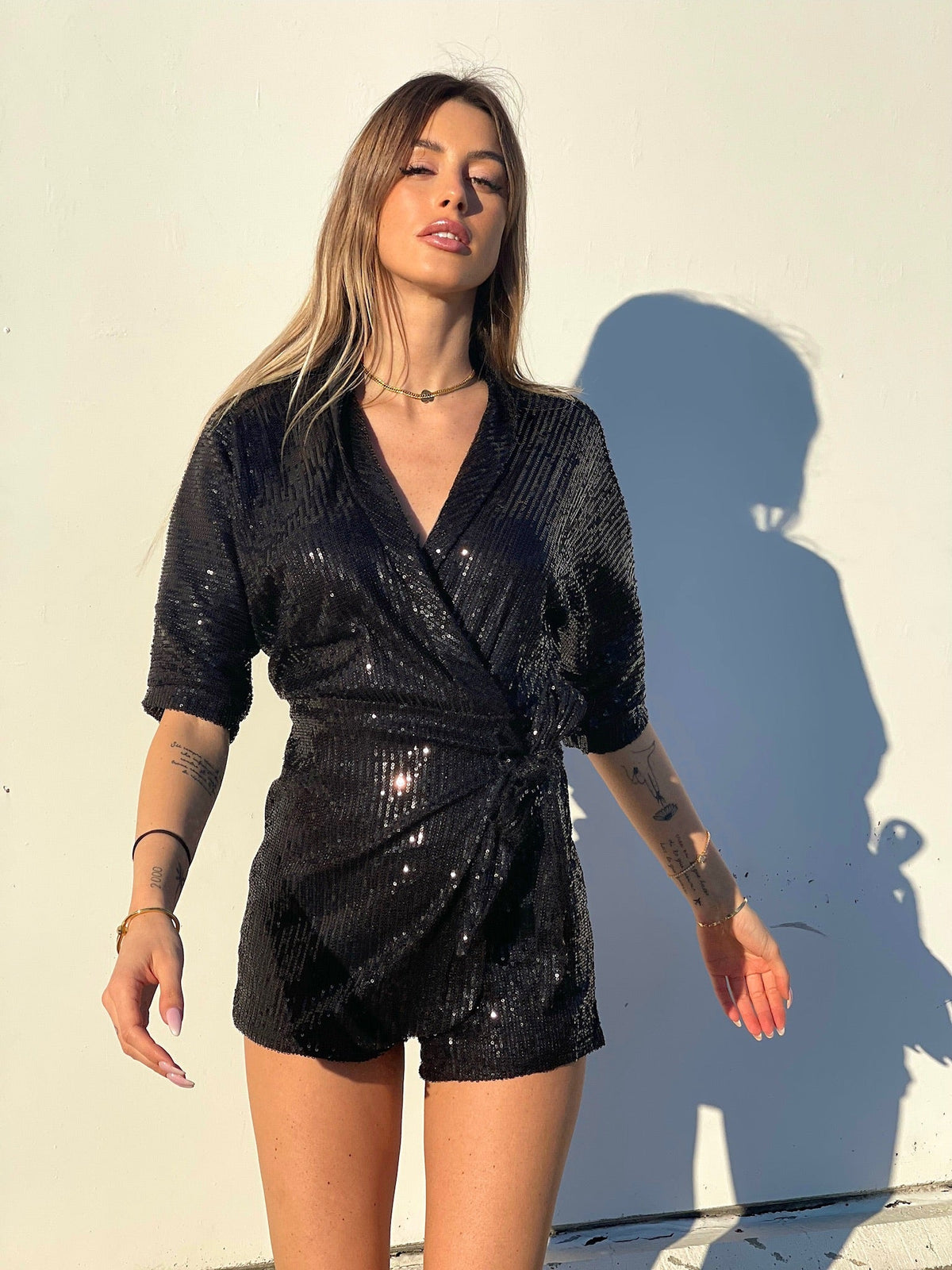 Tutina con paillette nera