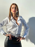 Camicetta bianca con piume