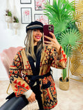 Cappottino nero dettaglio camel e rosso