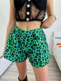Completo giacca e Short maculato verde