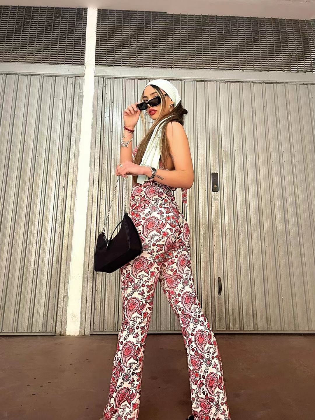 Completo top e pantalone dettaglio fucsia