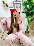 Completo sportivo con righe Rosa