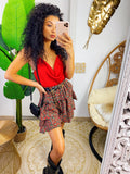 Gonna a balze con fiorellini rosso