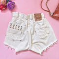 Levi’s Short Vintage bianco con borchie e strappi