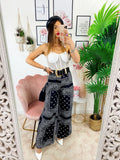 Pantalone a zampa stampa bandana Nero