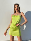 Abito in raso lime con dettaglio luce